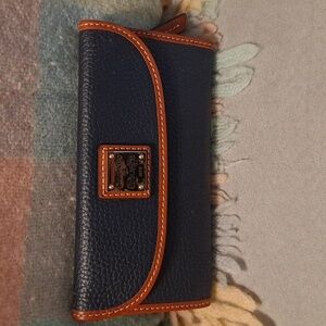 Dooney and Bourke Continental wallet in Midnight blue pebble leather